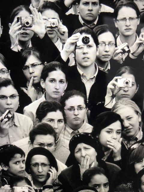 Black and white photo of a group of people. Used figuratively here.